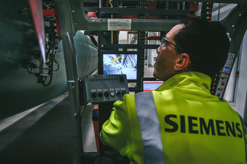 Engineer inspecting wind turbine blade at Siemens Gamesa Tangier