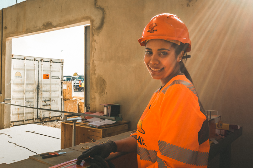 Female moroccan worker in Colas Rail catenary warehouse