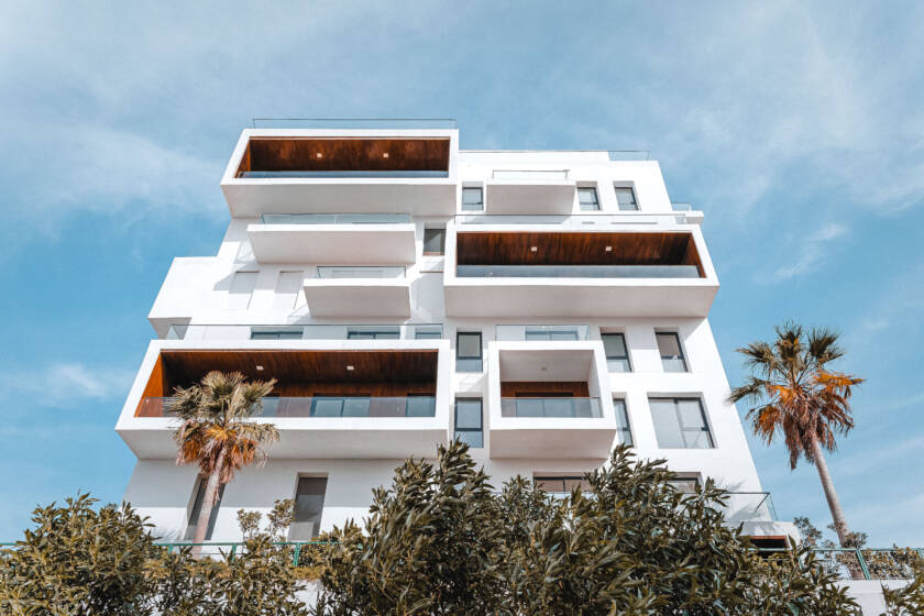 Architecture photography of apartment building in tanger morocco - low angle